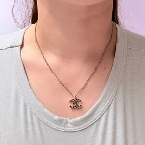 CHANEL Gold CC Pendant Necklace with Black Accents